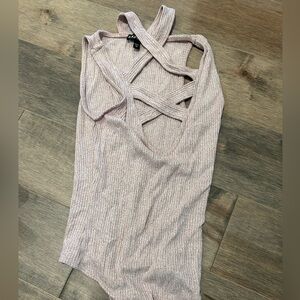Express cross body suit